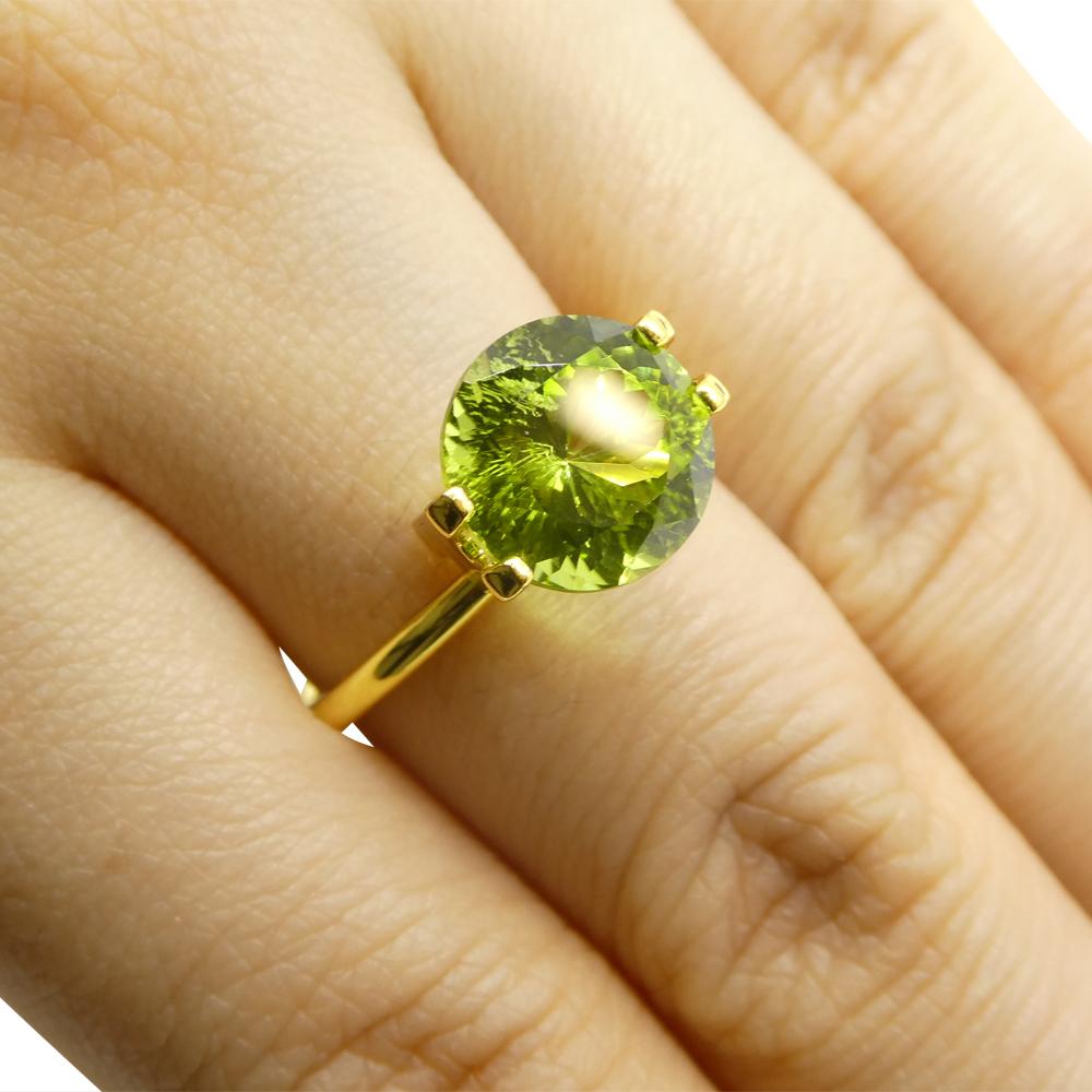 Brilliant Cut 4.03ct Round Yellowish Green Peridot from Sapat Gali, Pakistan For Sale