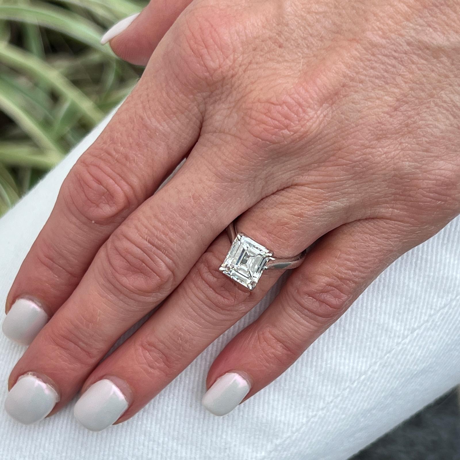 Beautiful and elegant 4.04 carat emerald cut diamond solitaire engagement ring crafted in 18 karat white gold. The emerald cut diamond weighs 4.04 carats and is GIA certified F color and VS1 clarity. See the report below. THe ring is currently size
