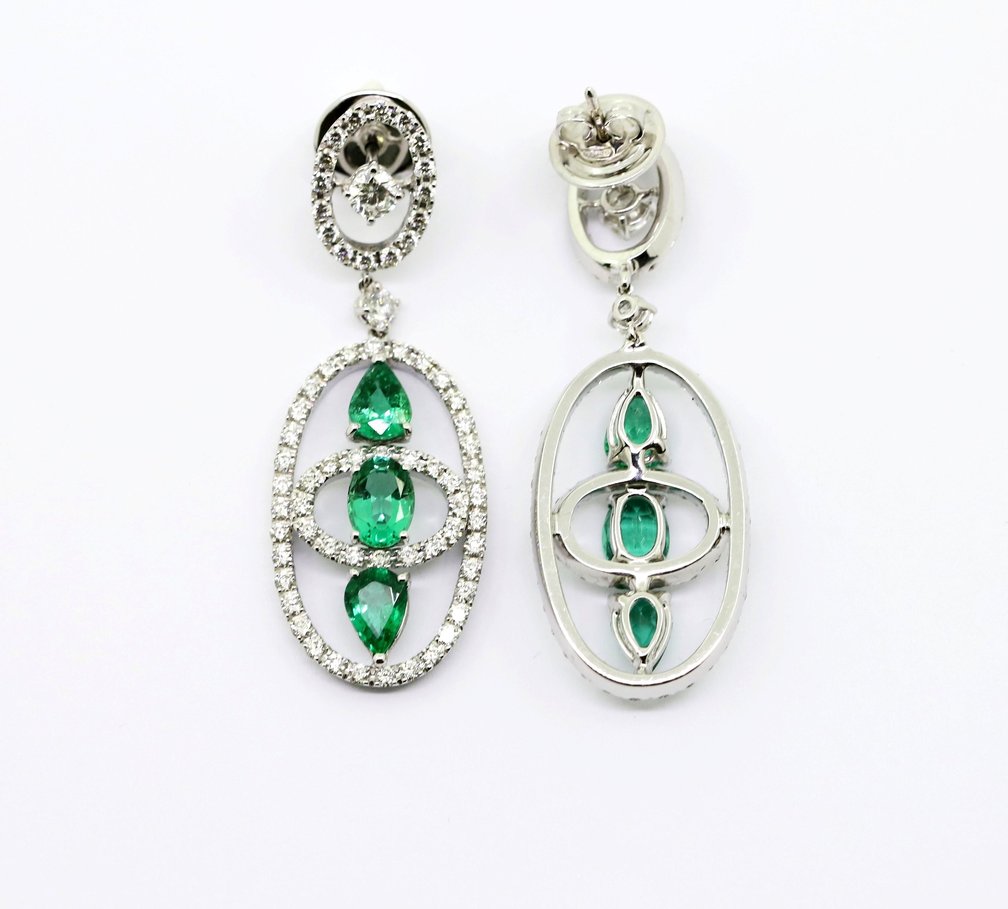 Contemporary 4.04 Carat Emeralds and 3.06 Carat White Diamonds Dangle Earrings For Sale