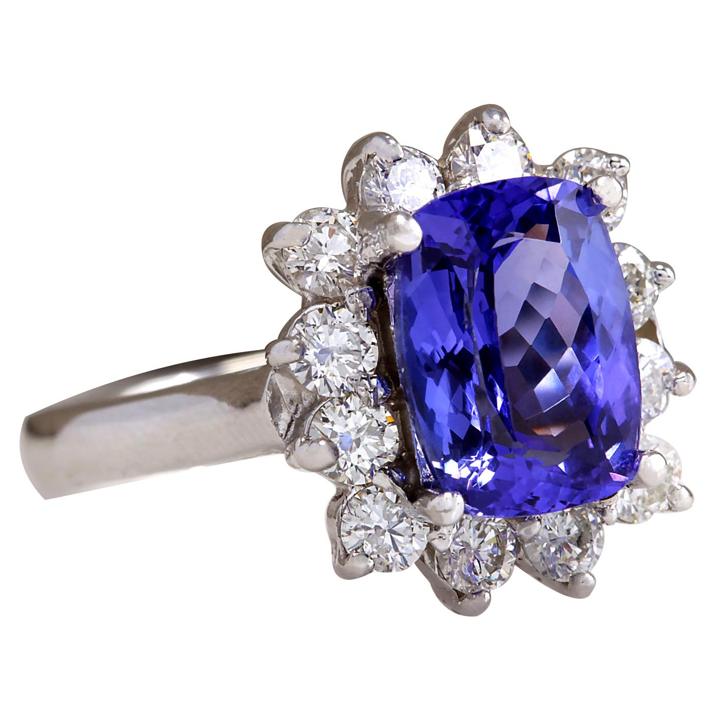 4.04 Carat Natural Tanzanite 14 Karat White Gold Diamond Ring
Stamped: 14K White Gold
Total Ring Weight: 4.8 Grams
Total Natural Tanzanite Weight is 3.14 Carat (Measures: 10.00x8.00 mm)
Color: Blue
Total Natural Diamond Weight is 0.90 Carat
Color:
