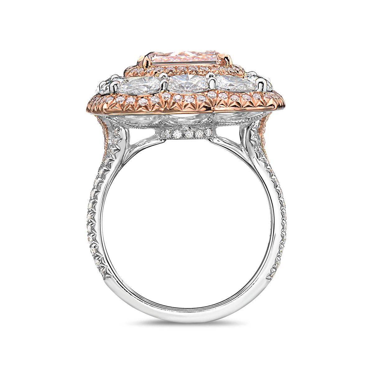 This 4.04 carat VS1 square radiant cut fancy brown pink diamond engagement ring features 0.37 carats of round diamonds and 1.97 carats of pear and marquise shape diamonds set in 18K white and rose gold. Total weight 9 grams. Size 6.

Can be resized