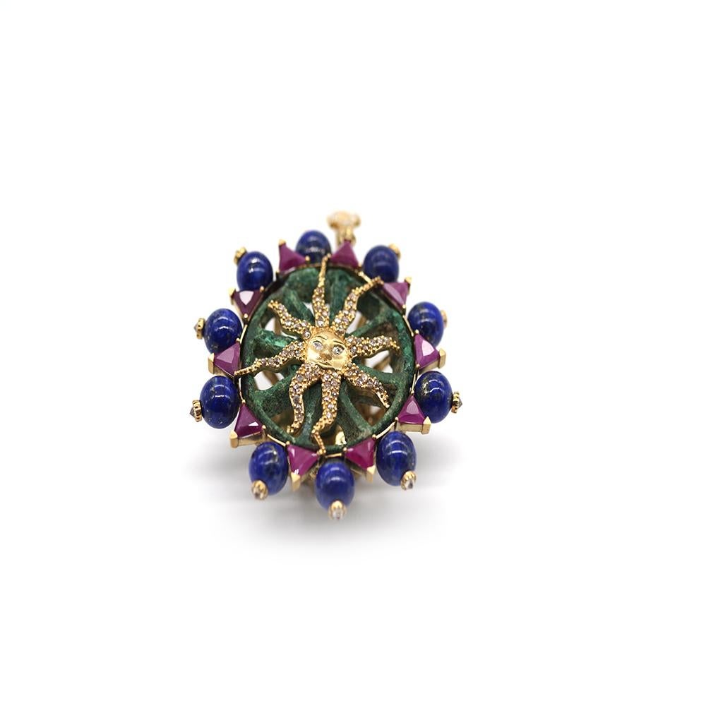 Antiquity Bactrian Bronze Seal Pendant Set in 20 Karat Yellow Gold. It Comes With 1.45cts Diamonds, 7.15cts Ruby, 0.25cts Sapphire, and 40.48cts Lapis. The Compartmentalized Seals Are Representative and Date Back To The 3rd Millennium. 