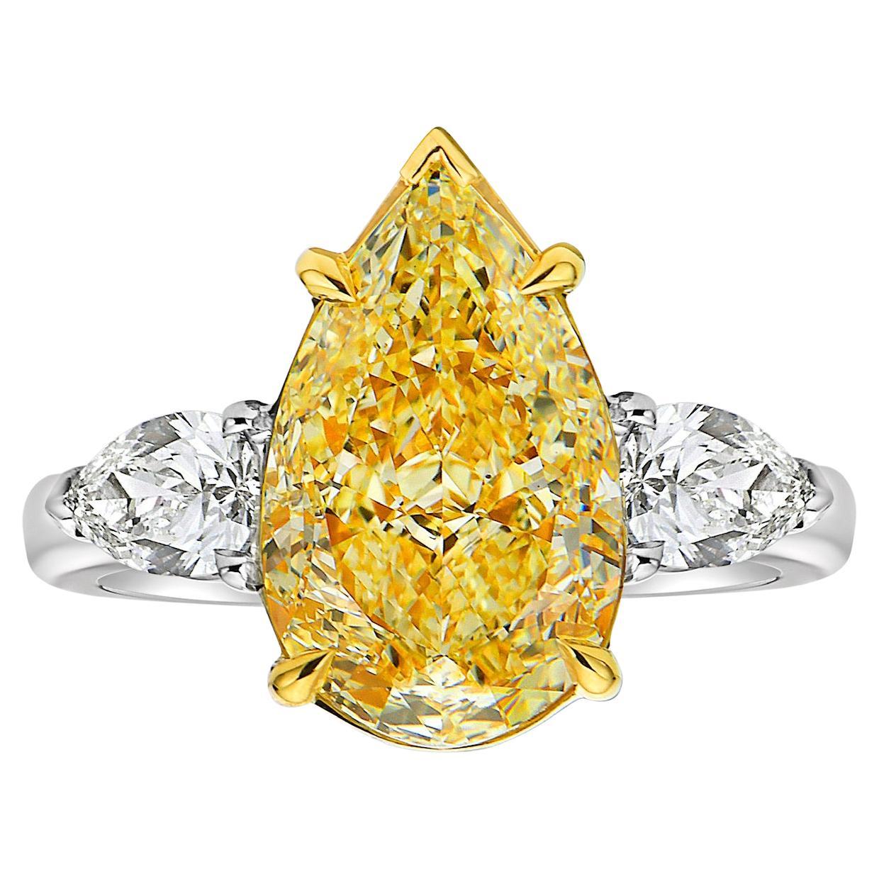 4.04 Carat Light Yellow Pear VS2 GIA Ring For Sale