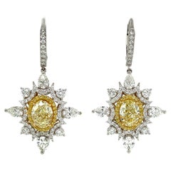 4.05 Carat Fancy Light Yellow Diamond Drop Earrings, Gia Certified IF, 18k Gold.