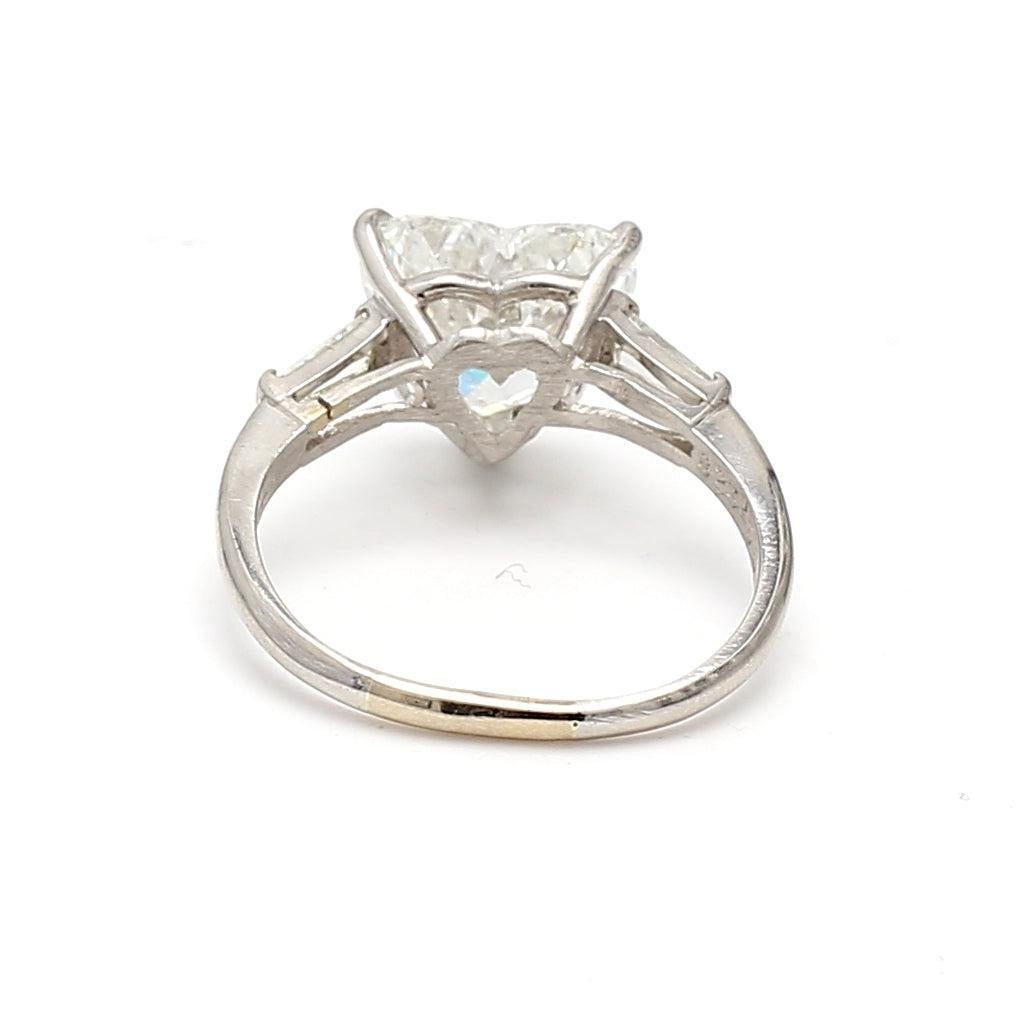 Women's 4.05 Carat Heart Shape and Tapered Baguette Diamond Platinum Engagement Ring For Sale