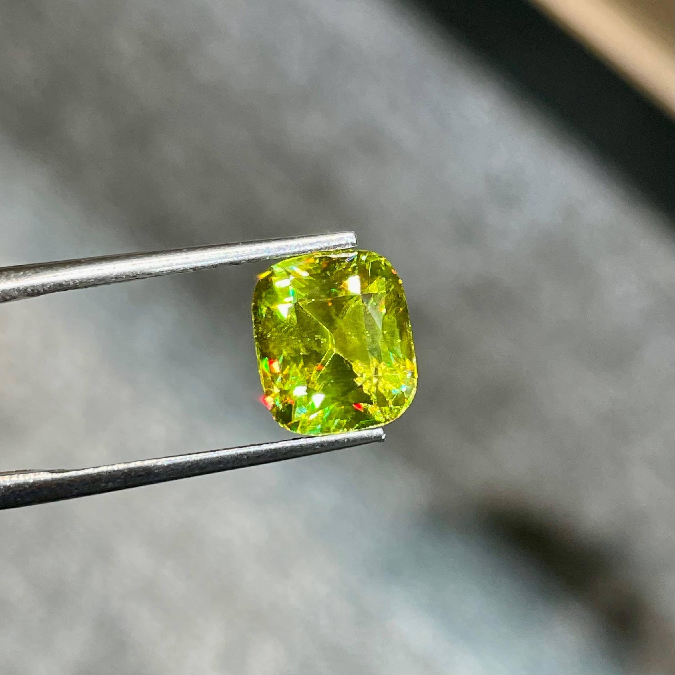 Weight 4.05 carats 
Dim 9.5x8.2x6.34 mm
Clarity VVS
Treatment None
Origin Madagascar
Shape Cushion
Cut Step Cushion




In the realm of exquisite gemstones, a dazzling 4.05-carat Sphene takes center stage, showcasing the epitome of top quality