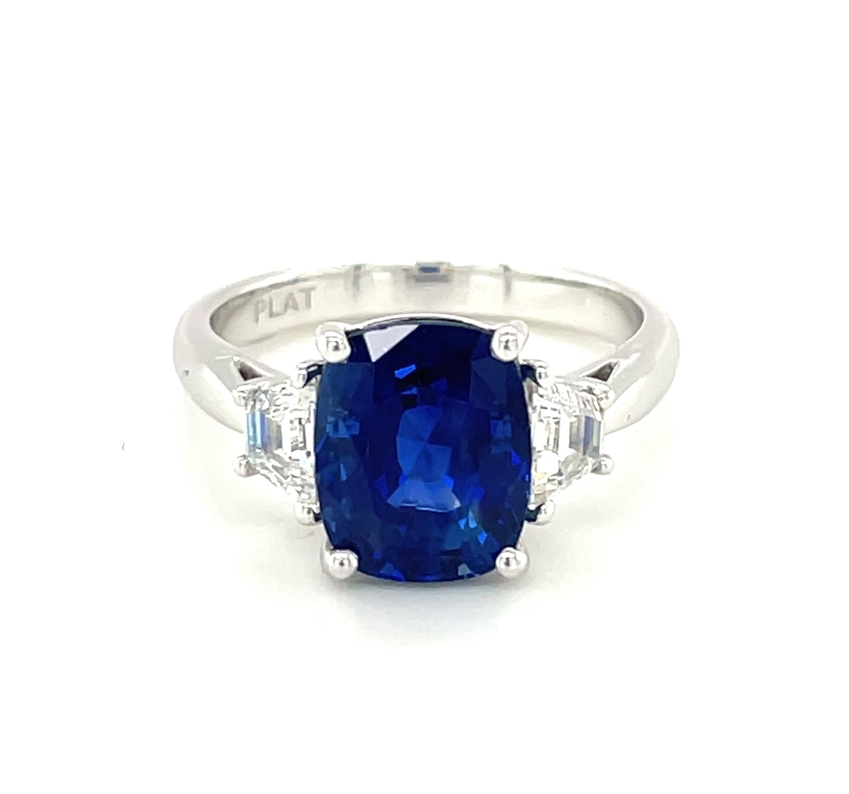 blue diamond 3 stone ring