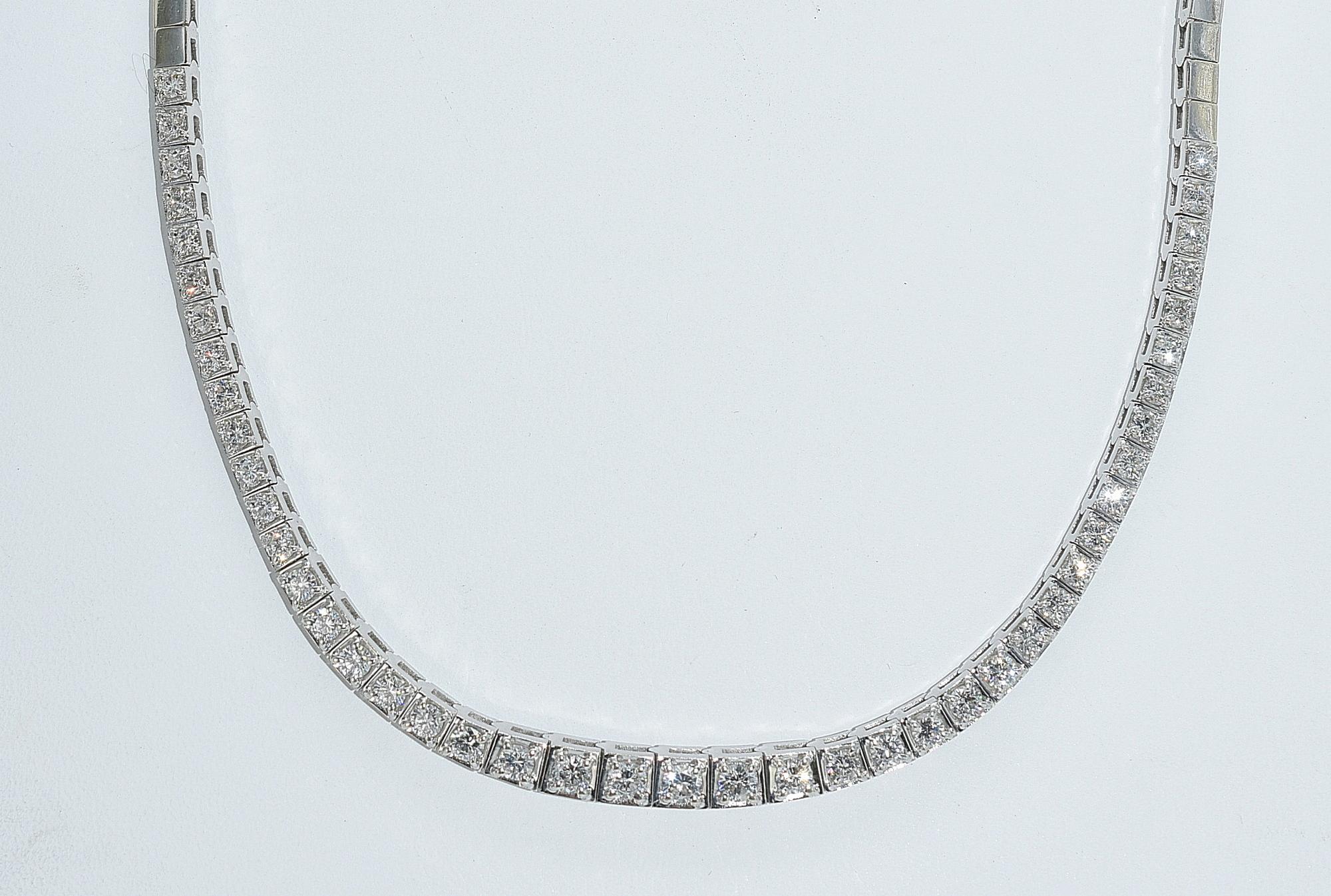 4.05cttw diamond and white gold necklace. 4.05 cttw diamond and 14k white gold necklace. 4.05 cttw, Clarity SI-3, Color H; 42 round brilliant cut diamonds, total diamond weight 4.05ct. Stamped 14K, approximately 17