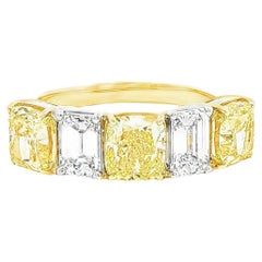4.05ct. Cushion Fancy Yellow & Emerald Cut Diamond Ring in 18KY Gold & Platinum