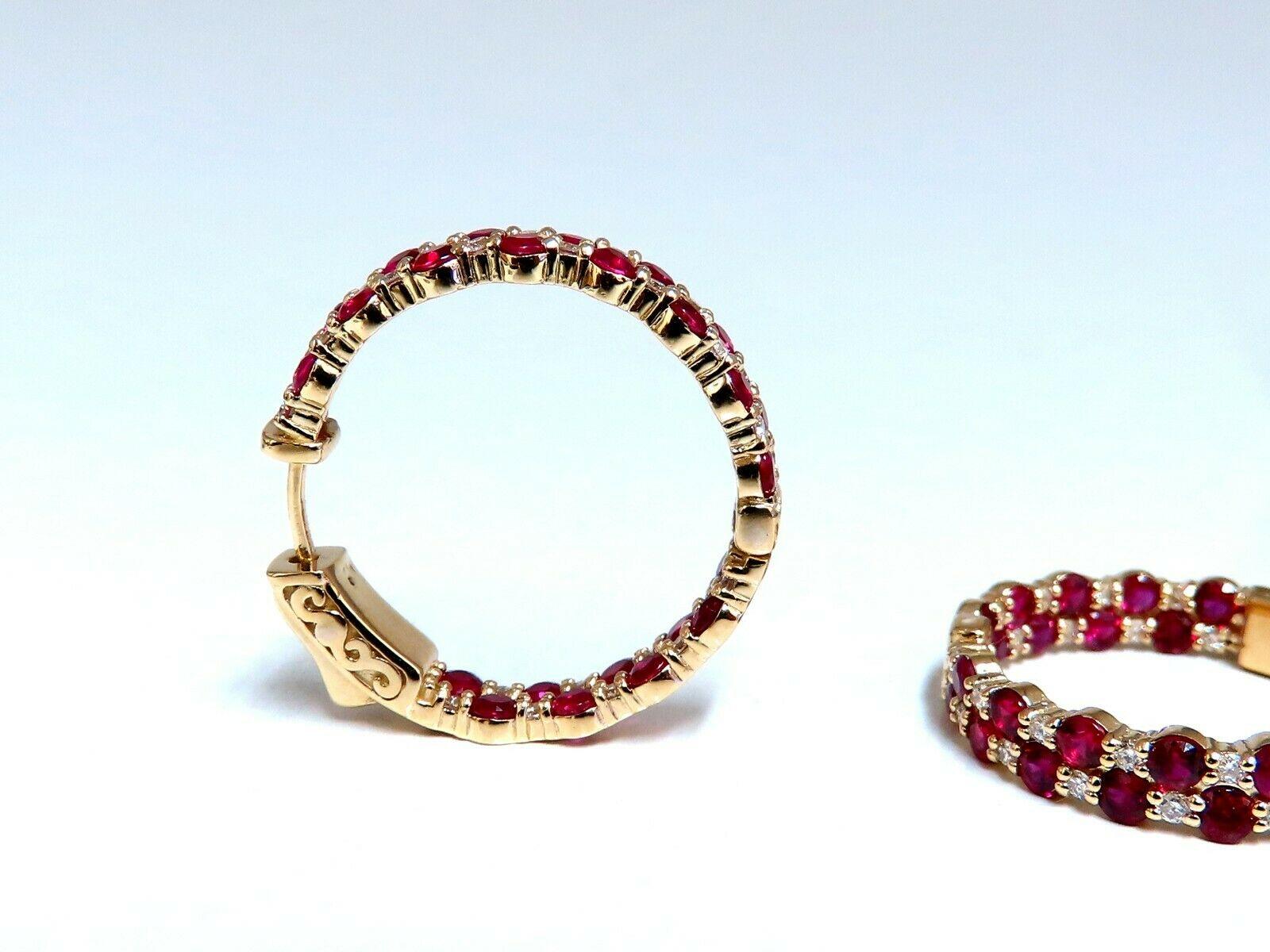 Ruby Diamonds Hoop Earrings.

3.50ct. Natural Rubies

Round Cuts

Vibrant and Red Strong Saturation

Clean Clarity and transparent

The Fine Gem Vivid Blood Red



.55ct. diamonds,

Rounds and full cuts.

G-color, Vs-2 clarity.

14kt. Yellow