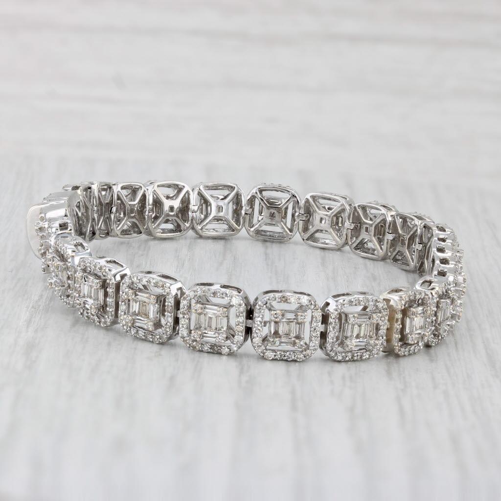 Gemstone Information:
- Natural Diamonds -
Total Carats - 2ctw 
Cut - Single
Color - G - K
Clarity - VS2 - I2

- Natural Diamonds -
Total Carats - 0.07ctw
Cut - Baguette
Color - I - L
Clarity - VS2

- Natural Diamonds -
Total Carats - 0.30ctw
Cut -