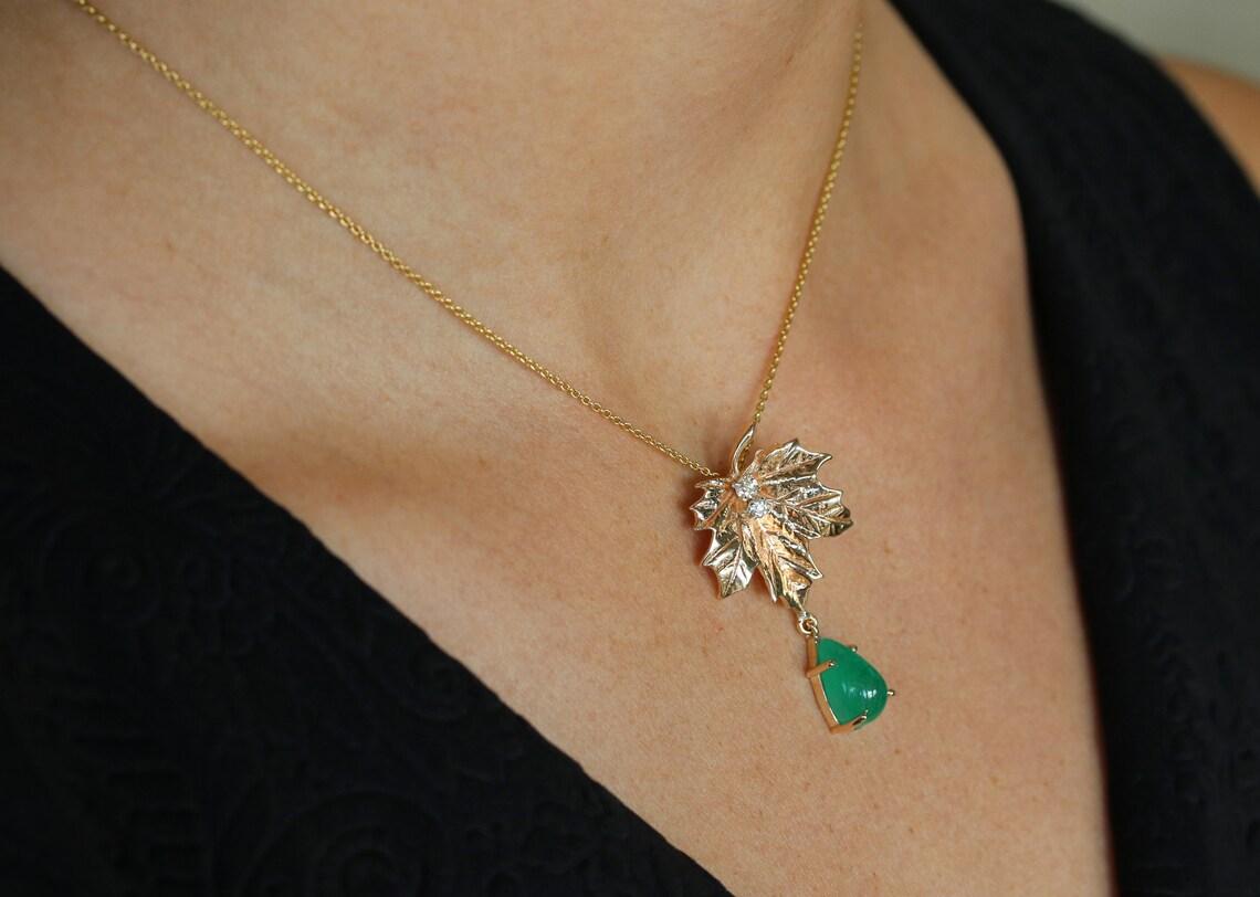 Women's 4.05tcw Colombian Emerald Vintage Maple Leaf Pendant Emerald Diamond Anniversary For Sale