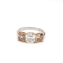4.06 Carat Asscher Cut Fancy Y-O-B Diamond 18K Gold Three-Stone Ring