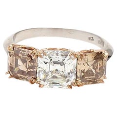 Vintage 4.06 Carat Asscher Cut Fancy Y-O-B Diamond 18K Gold Three-Stone Ring