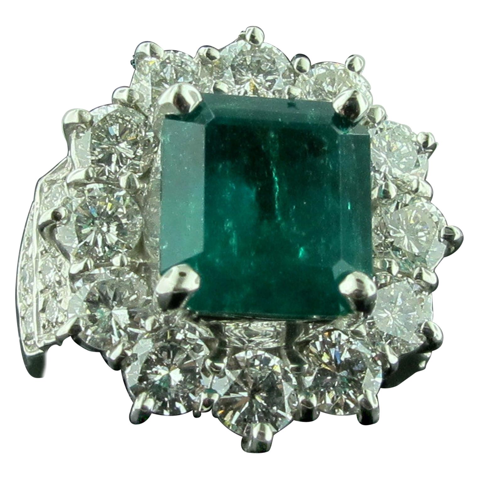 4.06 Carat Emerald Ring with 2.22 Carat of Diamond For Sale