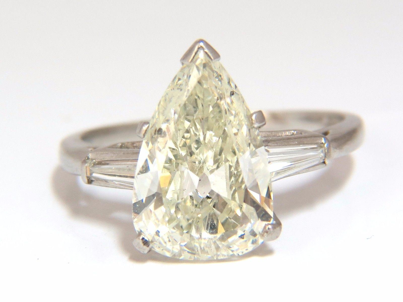 Pear Classic

 3.77ct. Natural Pear cut diamond ring.

L-color

Si-2 clarity

13.9 X 9.3mm

Excellent Brilliance.

Platinum

6.1 grams.

current ring size: 9.25

We may resize, please inquire.

$45,000 Appraisal Certificate to accompany