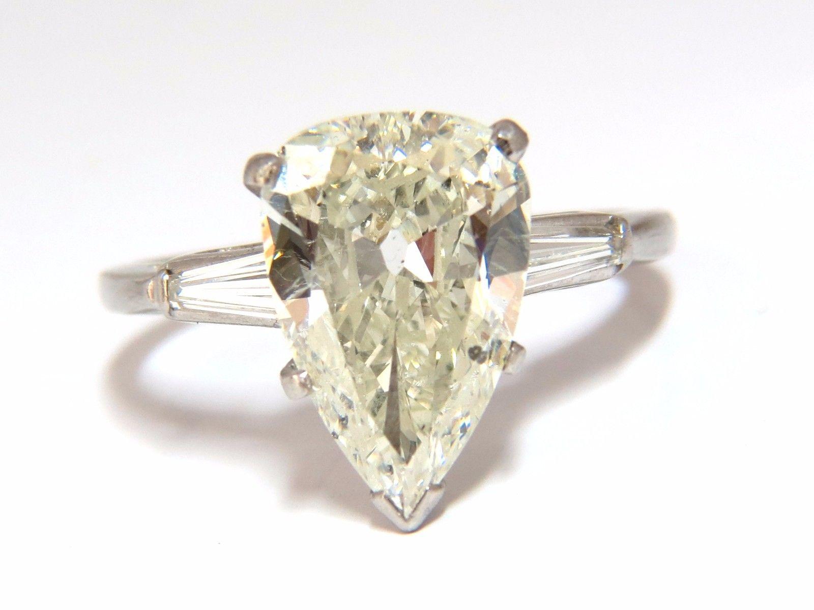 3.77 Carat Natural Pear Shape Diamond Platinum Ring Baguette Classic In New Condition For Sale In New York, NY