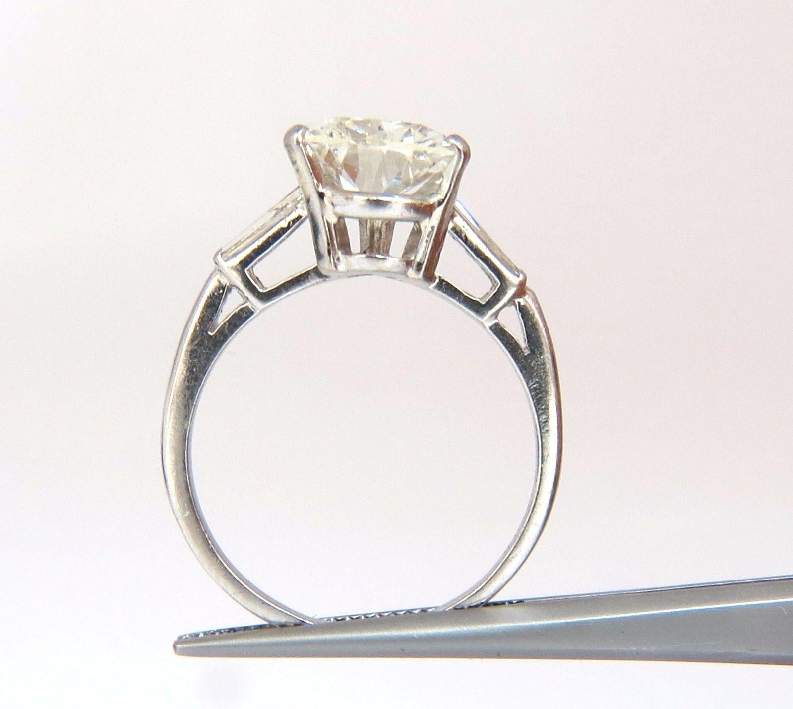 3.77 Carat Natural Pear Shape Diamond Platinum Ring Baguette Classic For Sale 1