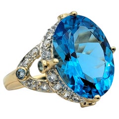 4.06 Carat Swiss Blue Topaz Cocktail Ring with White Topaz 14 Karat Yellow Gold