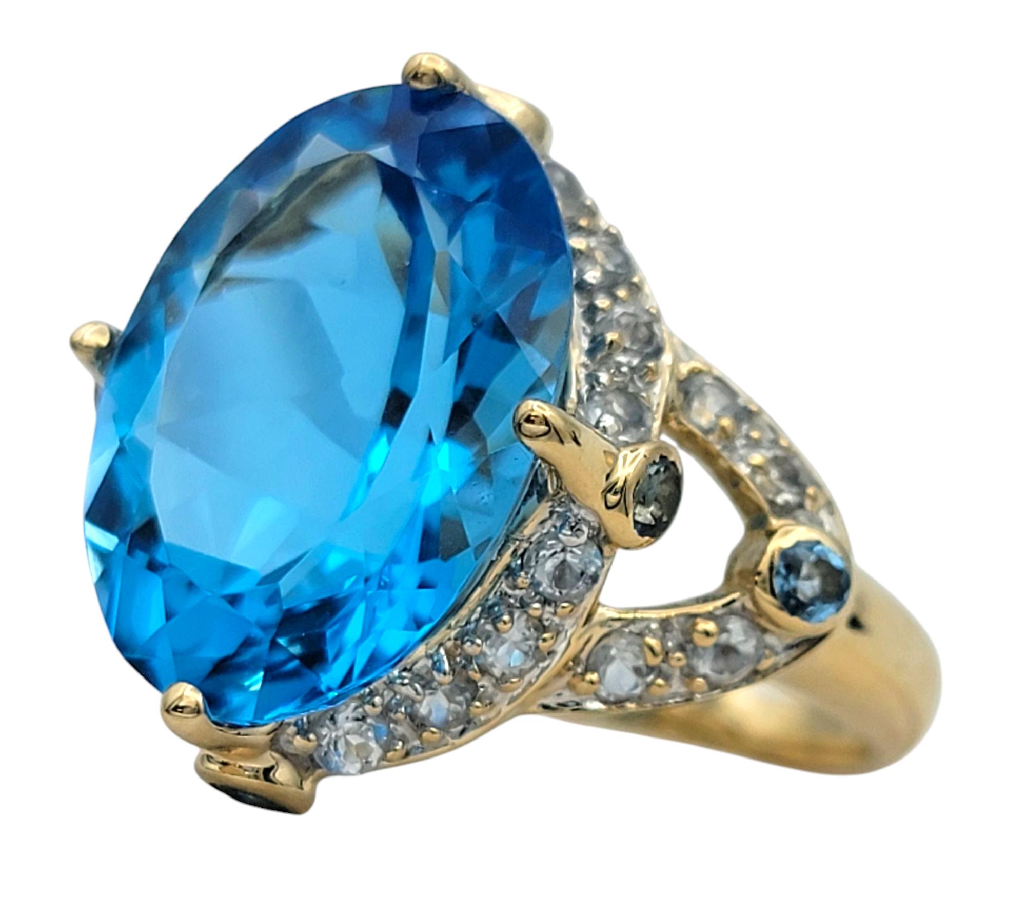 Contemporary 4.06 Carat Swiss Blue Topaz Cocktail Ring with White Topaz 14 Karat Yellow Gold For Sale