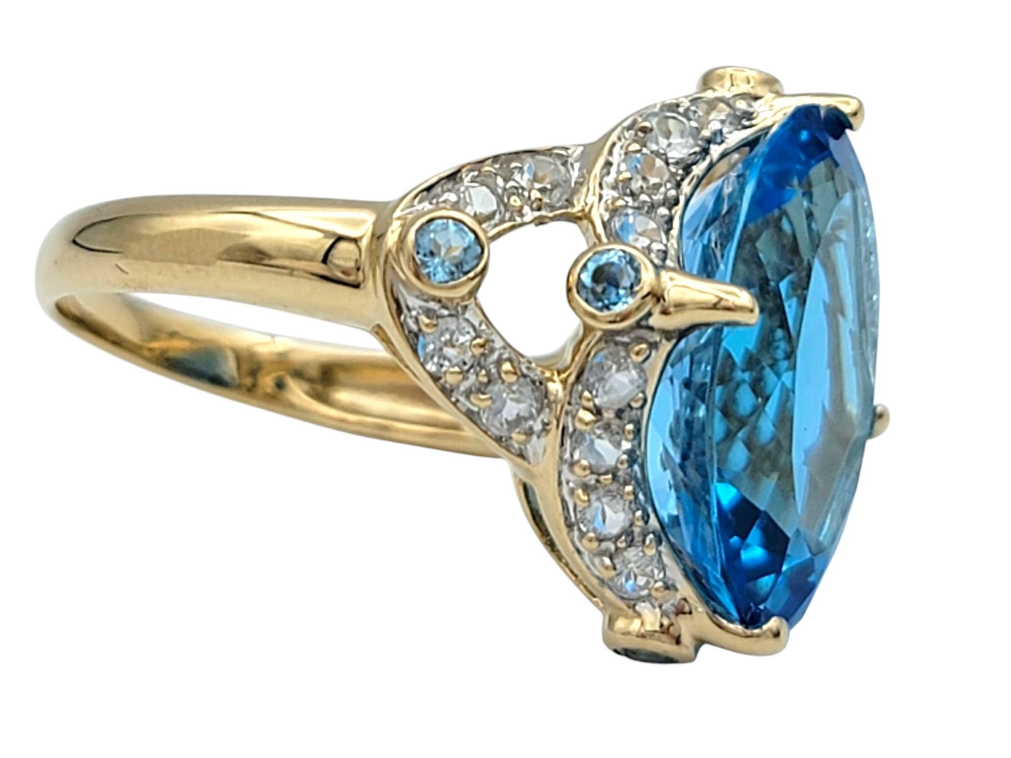 Women's 4.06 Carat Swiss Blue Topaz Cocktail Ring with White Topaz 14 Karat Yellow Gold For Sale