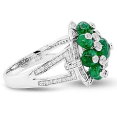 4.06 Carat Vivid Green Emerald & 0.49 Carats Diamond Unique 18K Ring