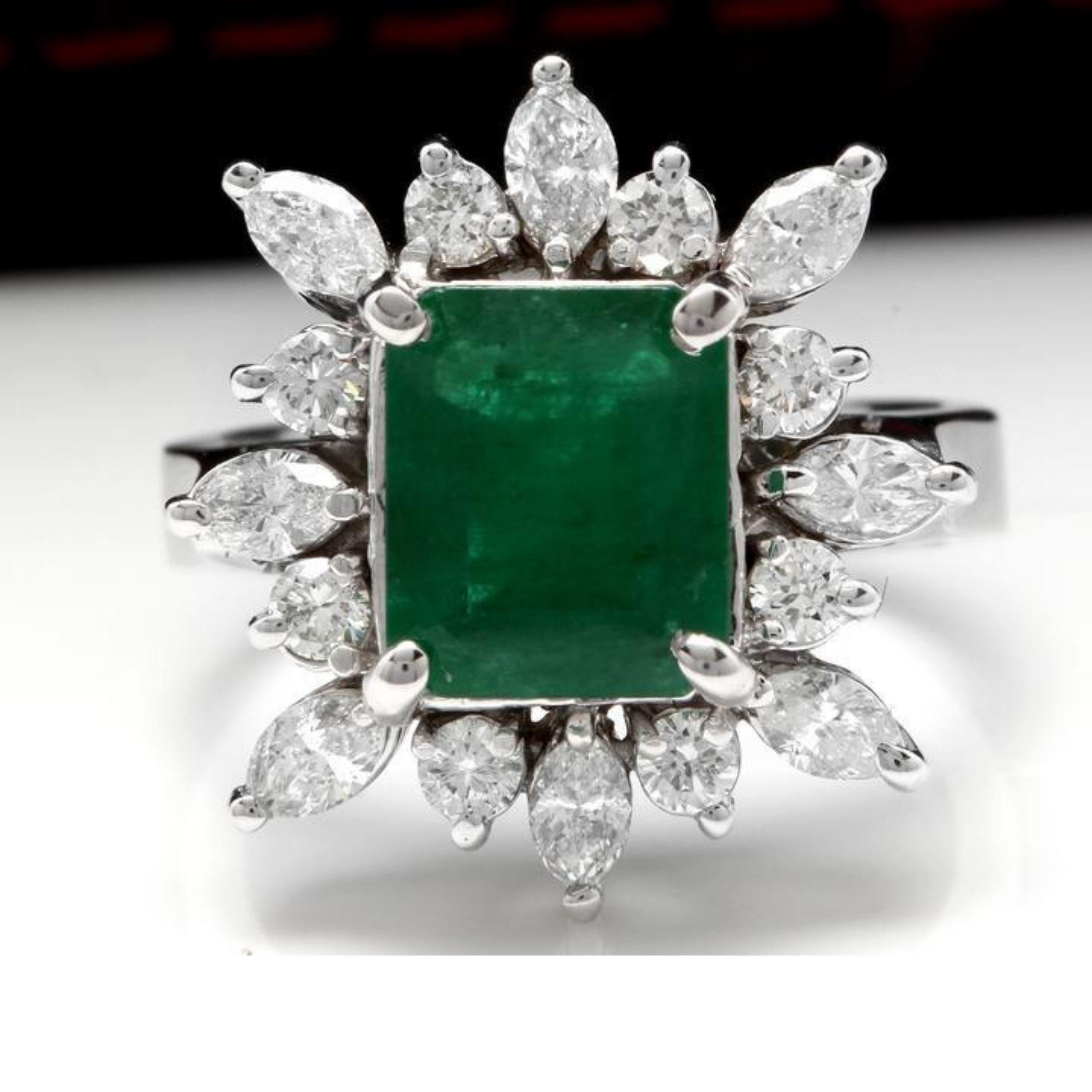 4.06 Carats Natural Emerald and Diamond 14K Solid White Gold Ring

Total Natural Green Emerald Weight is: Approx. 2.56 Carats (transparent)

Emerald Measures: Approx. 9.11 x 7.66mm

Emerald Treatment: Oiling

Natural Round & Marquise Diamonds