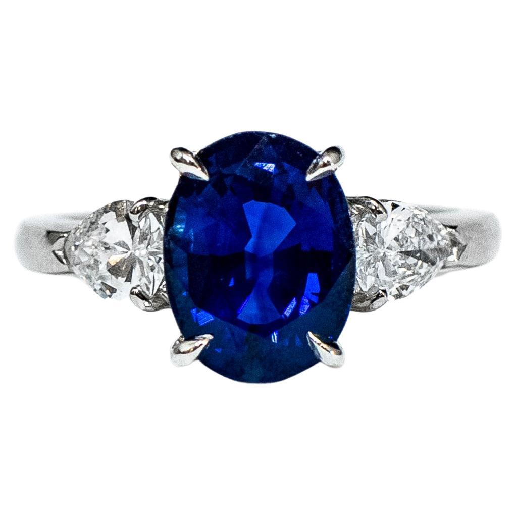 4.06 ct Sapphire & Pear Shape Diamond Ring For Sale