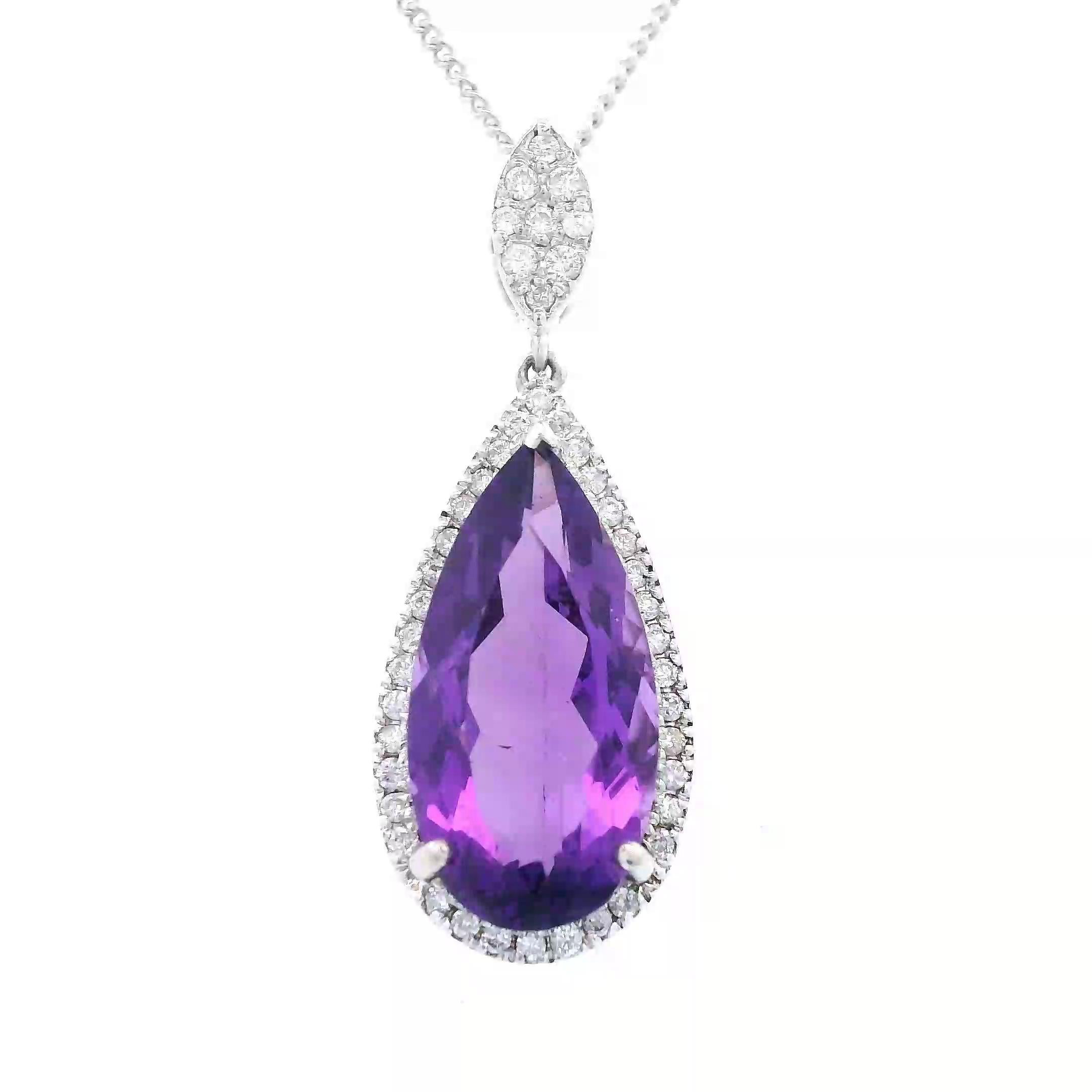 Stunning amethyst and diamond pendant necklace.
4.29 carats total gemstone weight.
4.06 carat pear amethyst. 45 round brilliant diamonds, 0.23 carats. Approximately G color and VS2 clarity. 14-karat white gold, 4.31 grams, 18 inches.
Accommodated