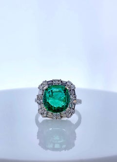 4.06CT Green Emerald and 1.10CTW Diamond Ring in 18k White Gold