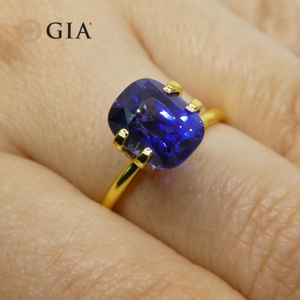 This is a stunning GIA Certified Sapphire

 The GIA report reads as follows:

GIA Report Number: 2215962444
Shape: Cushion
Cutting Style:
Cutting Style: Crown: Modified Brilliant Cut
Cutting Style: Pavilion: Step Cut
Transparency: Transparent
Color: