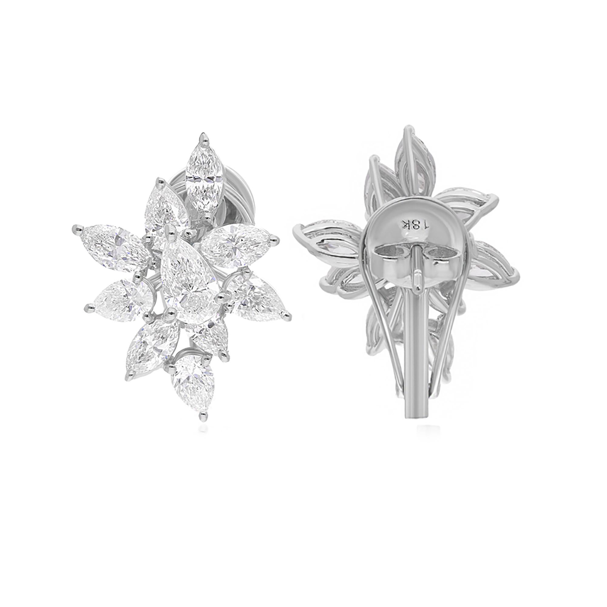 Indulge in the timeless elegance of these stunning 4.07 Carat Pear & Marquise Diamond Stud Earrings, exquisitely crafted in 14 Karat White Gold. A harmonious fusion of classic charm and contemporary sophistication, these earrings are sure to