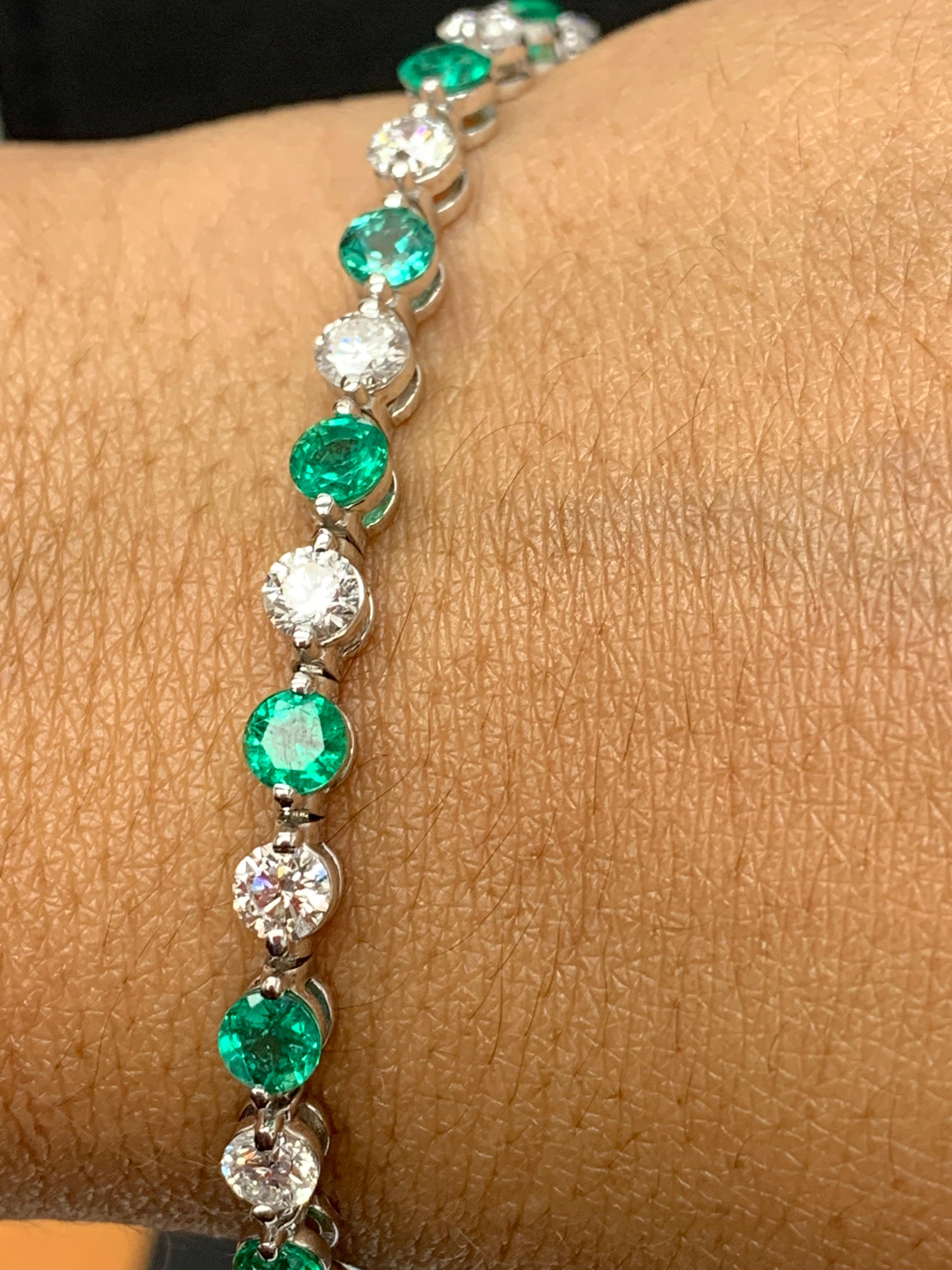 A stunning bracelet set with 16 Lush Green Emerald weighing 4.07 carat total. Alternating these emeralds are 16 sparkling round diamonds weighing 3.92 carats in total. Set in polished 14k white gold. Double lock mechanism for maximum security. A