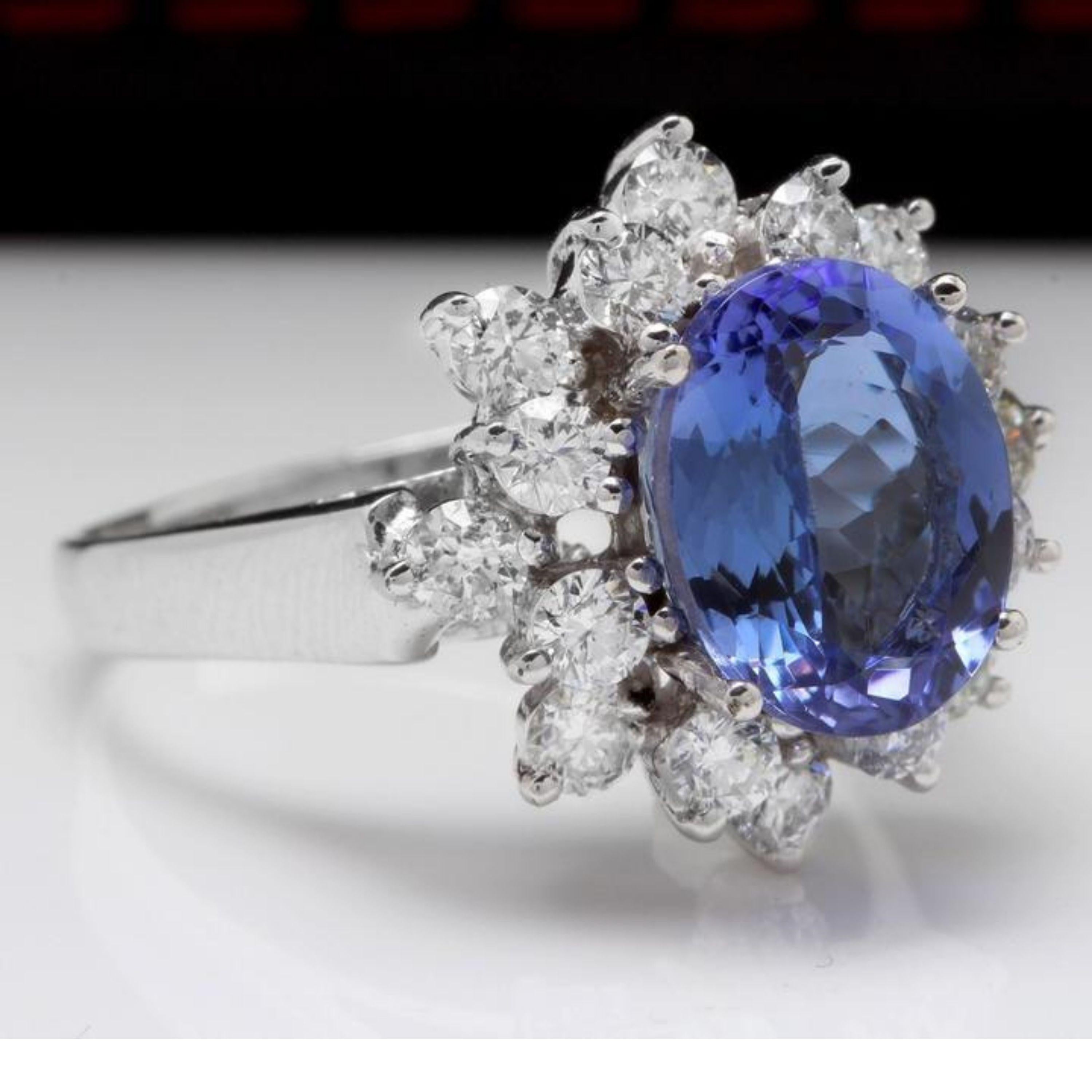 4.07 Carats Natural Very Nice Looking Tanzanite and Diamond 14K Solid White Gold Ring

Total Natural Oval Cut Tanzanite Weight is: Approx. 2.82 Carats

Tanzanite Treatment: Heat

Natural Round Diamonds Weight: Approx. 1.25 Carats (color G-H /