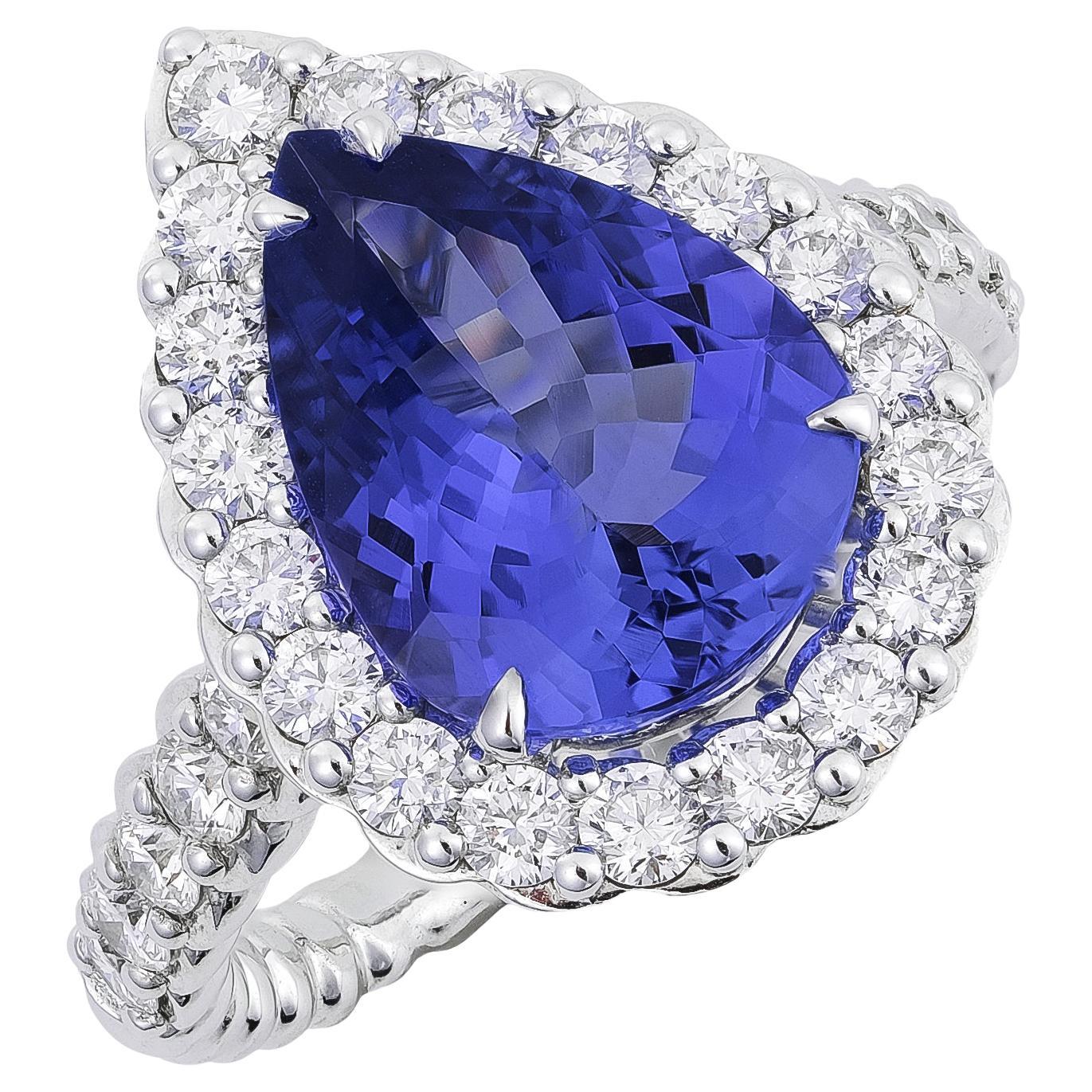 4.07 cts Natural Tanzanite 
1.28 cts Diamonds 18K White Gold Ring For Sale