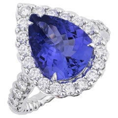 4.07 cts Natural Tanzanite 
1.28 cts Diamonds 18K White Gold Ring