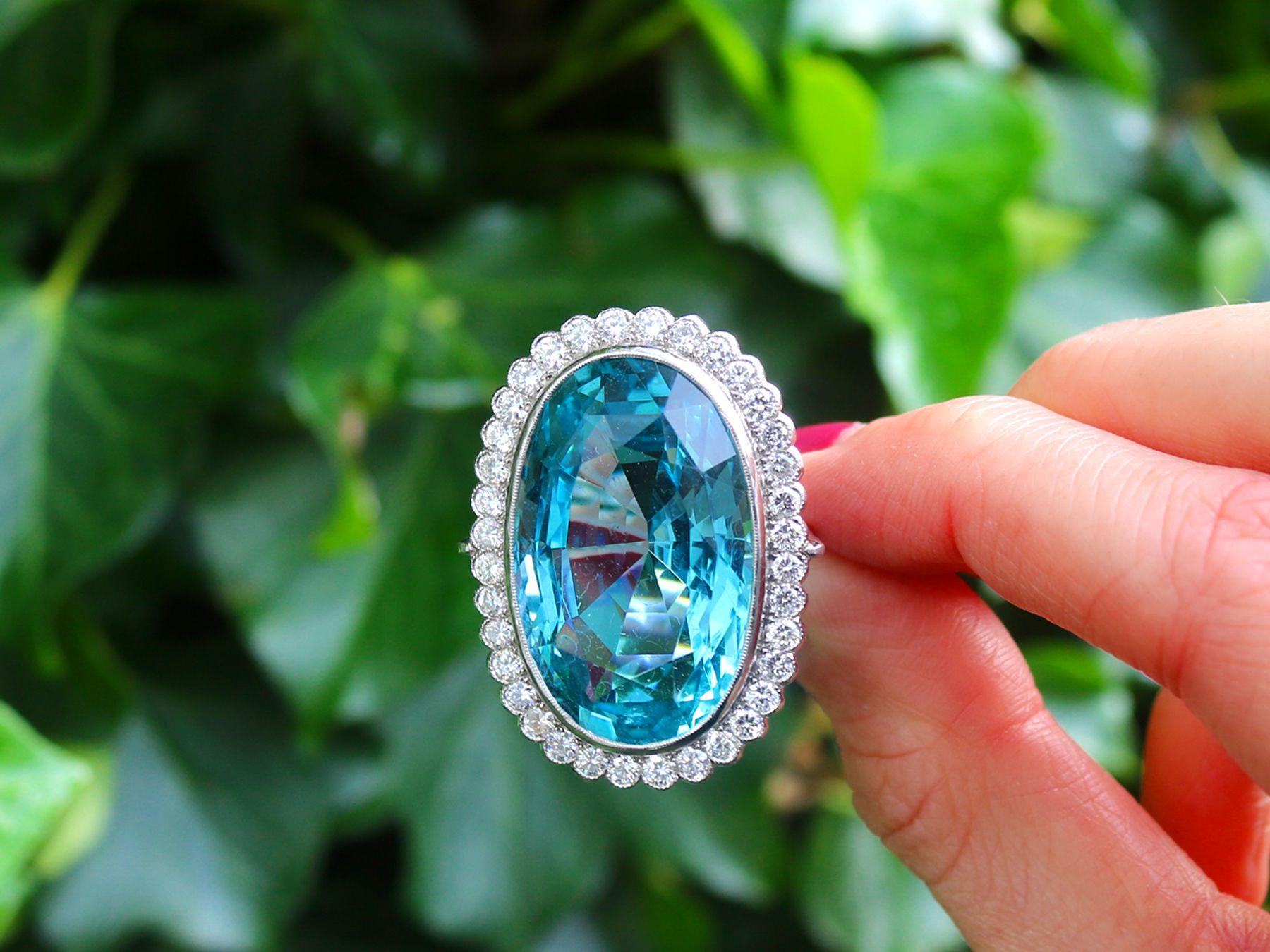 A stunning, fine, and impressive 40.72 carat aquamarine and 1.82 carat diamond platinum dress ring; part of our diverse collection of vintage jewelry and estate jewelry.

This stunning, fine and impressive vintage aquamarine ring has been crafted in