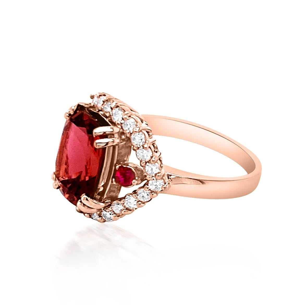 14K ROSE GOLD NATURAL COPPER BEARING PARAIBA TOURMALINE RING:4.68 GRAMS/DIAMOND:0.67CT/RUBY:0.14CT/COPPER BEARING PARAIBA TOURMALINE:4.07CT/#GVR1042 **Pink Tourmaline strengthens one's heart and links it to the heart of the Earth. This striking,