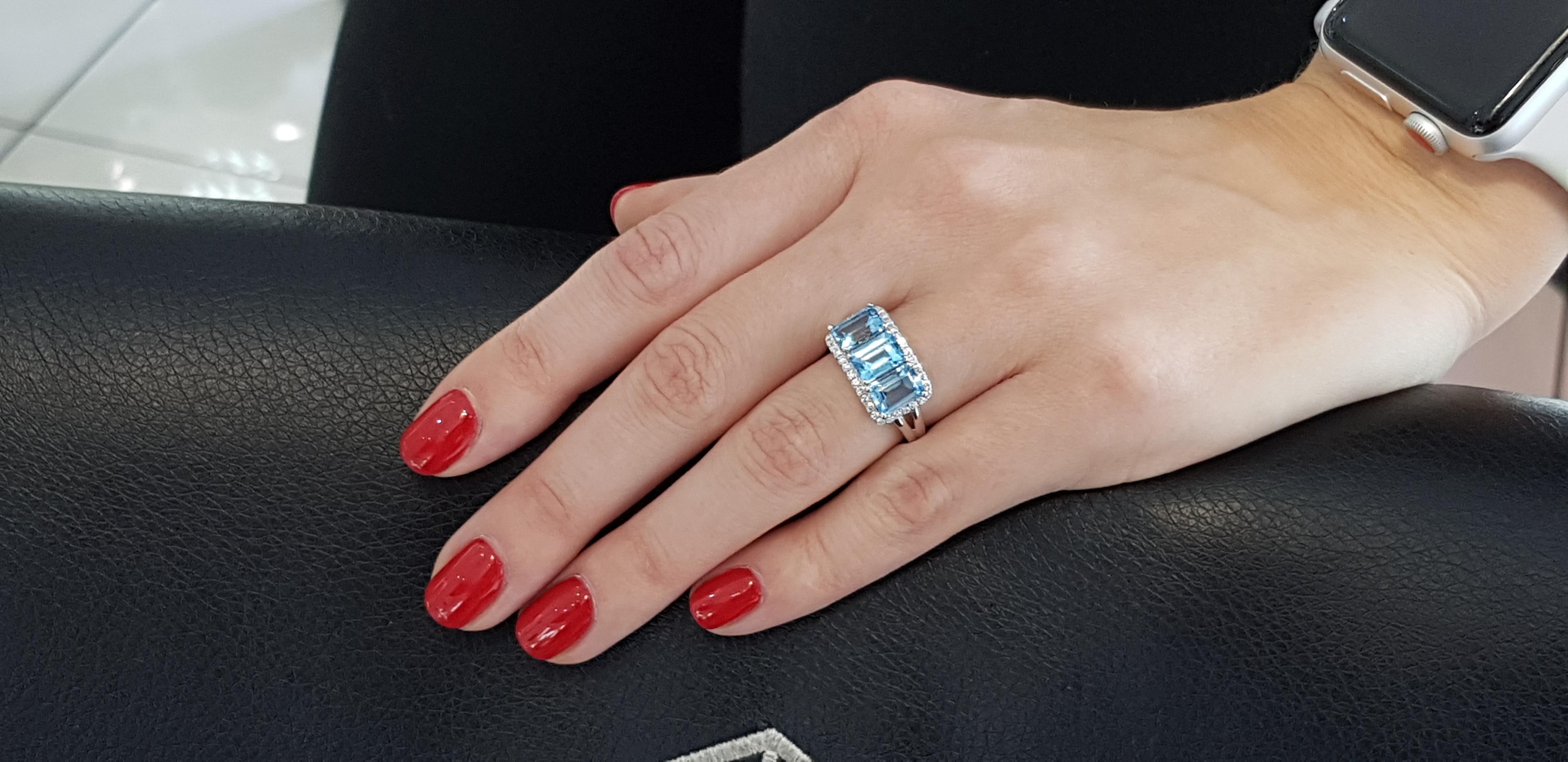 Women's 4.08 Carat Emerald Cut Blue Topaz Diamond Halo 18 KT White Gold Engagement Ring For Sale