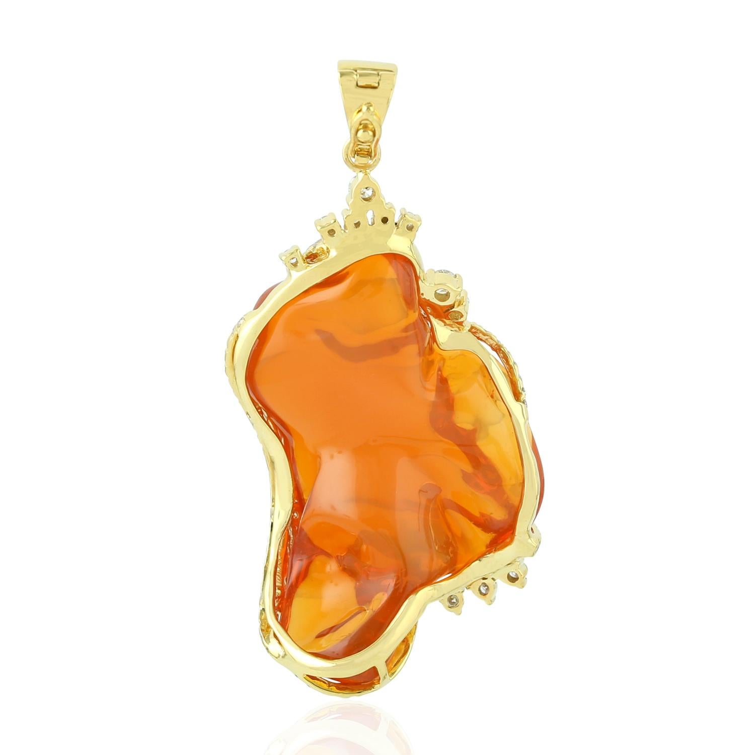Cast in 18 Karat gold, this beautiful pendant features 40.8 carats of fire opal & 1.16 carats of sparkling diamonds. 

FOLLOW MEGHNA JEWELS storefront to view the latest collection & exclusive pieces. Meghna Jewels is proudly rated as a Top Seller