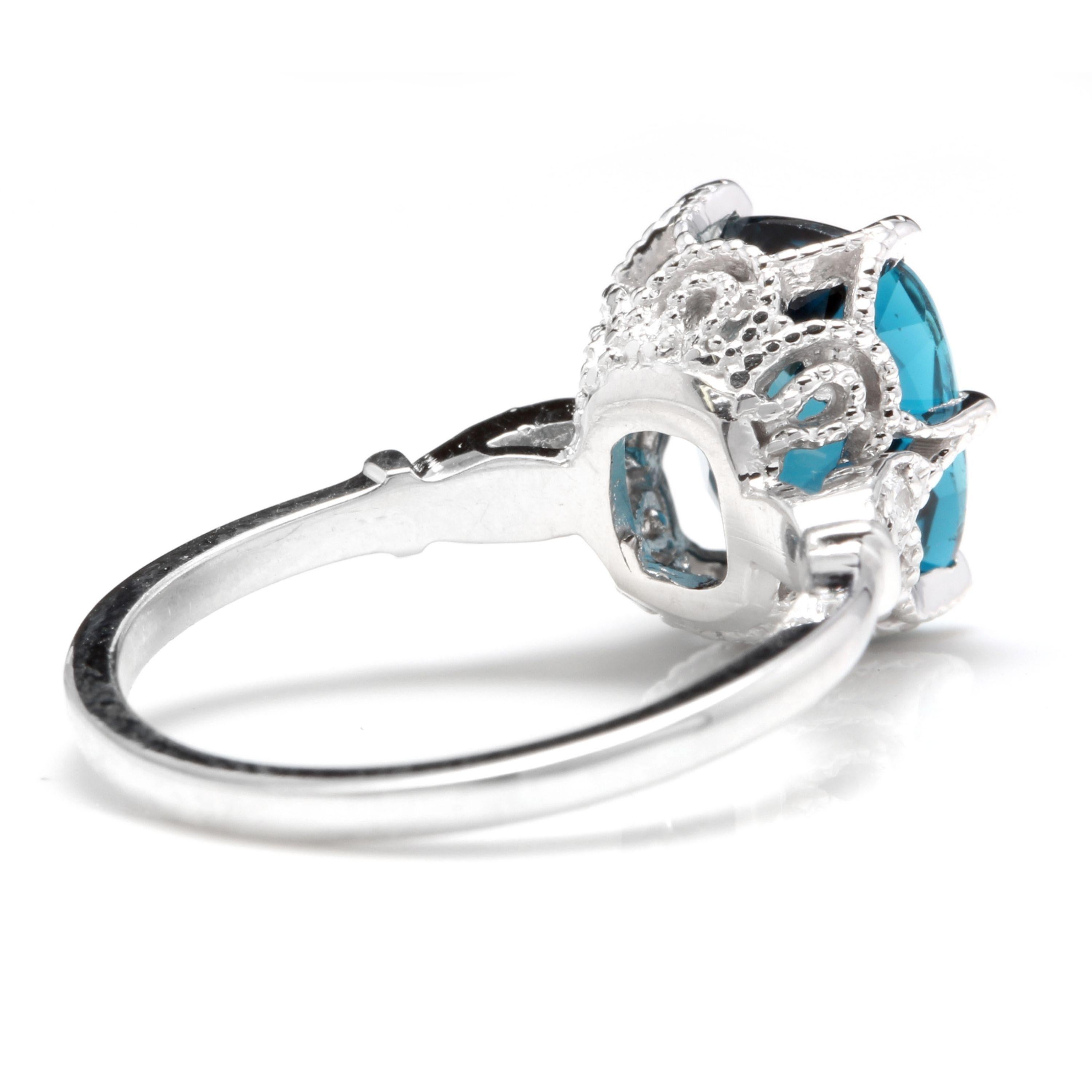 Mixed Cut 4.08 Carat Natural Impressive London Blue Topaz and Diamond 14 Karat Gold Ring For Sale