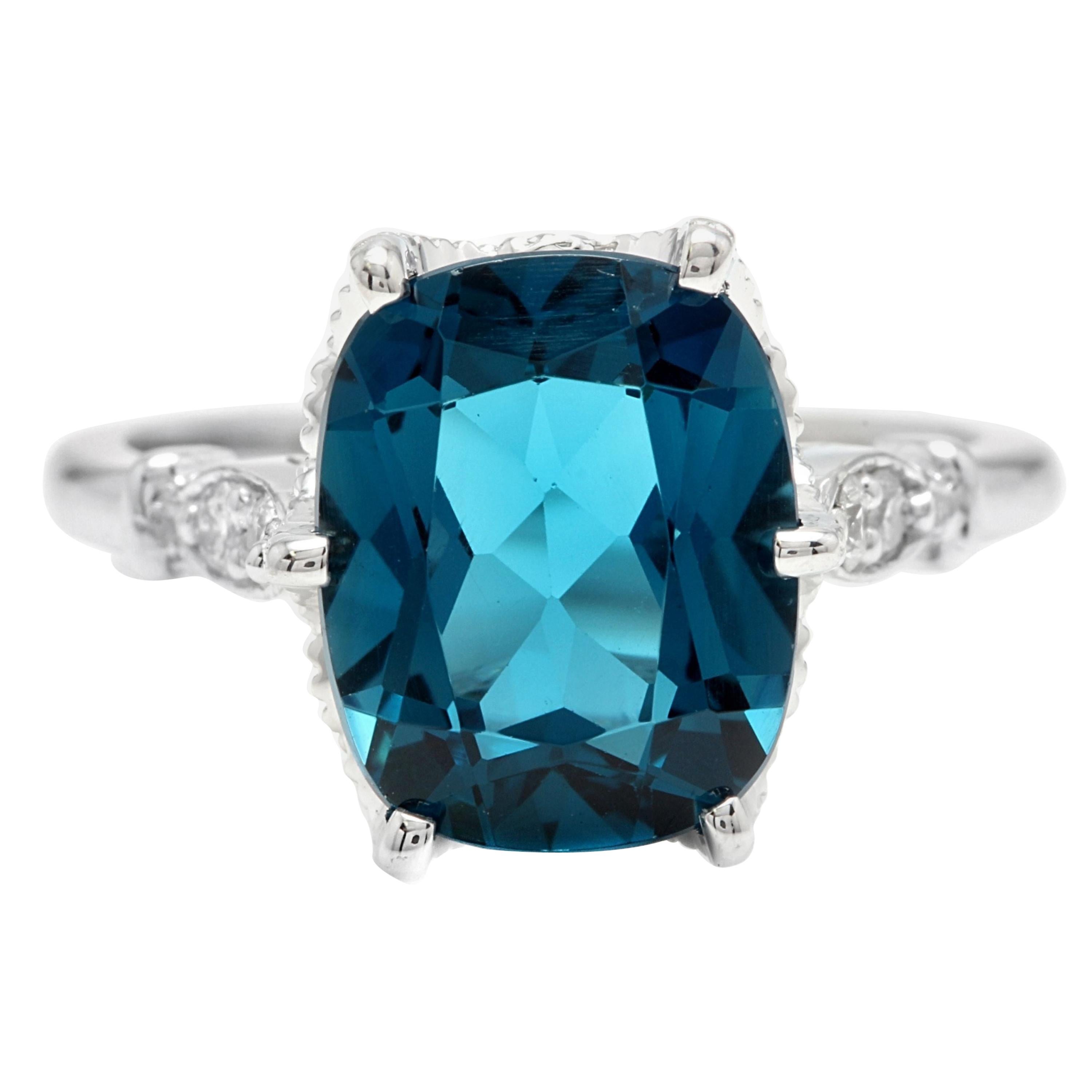 4.08 Carat Natural Impressive London Blue Topaz and Diamond 14 Karat Gold Ring For Sale