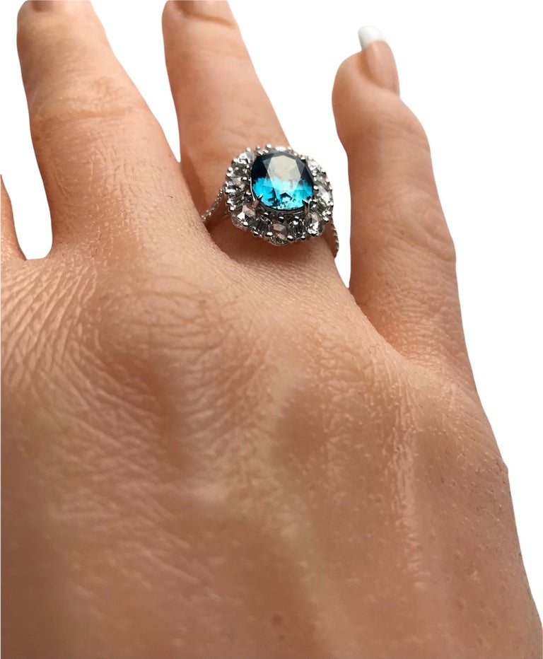 Women's 4.08 Carat Oval Cut Blue Zircon and 0.96 Carat Diamond Ring in 18k White Gold For Sale