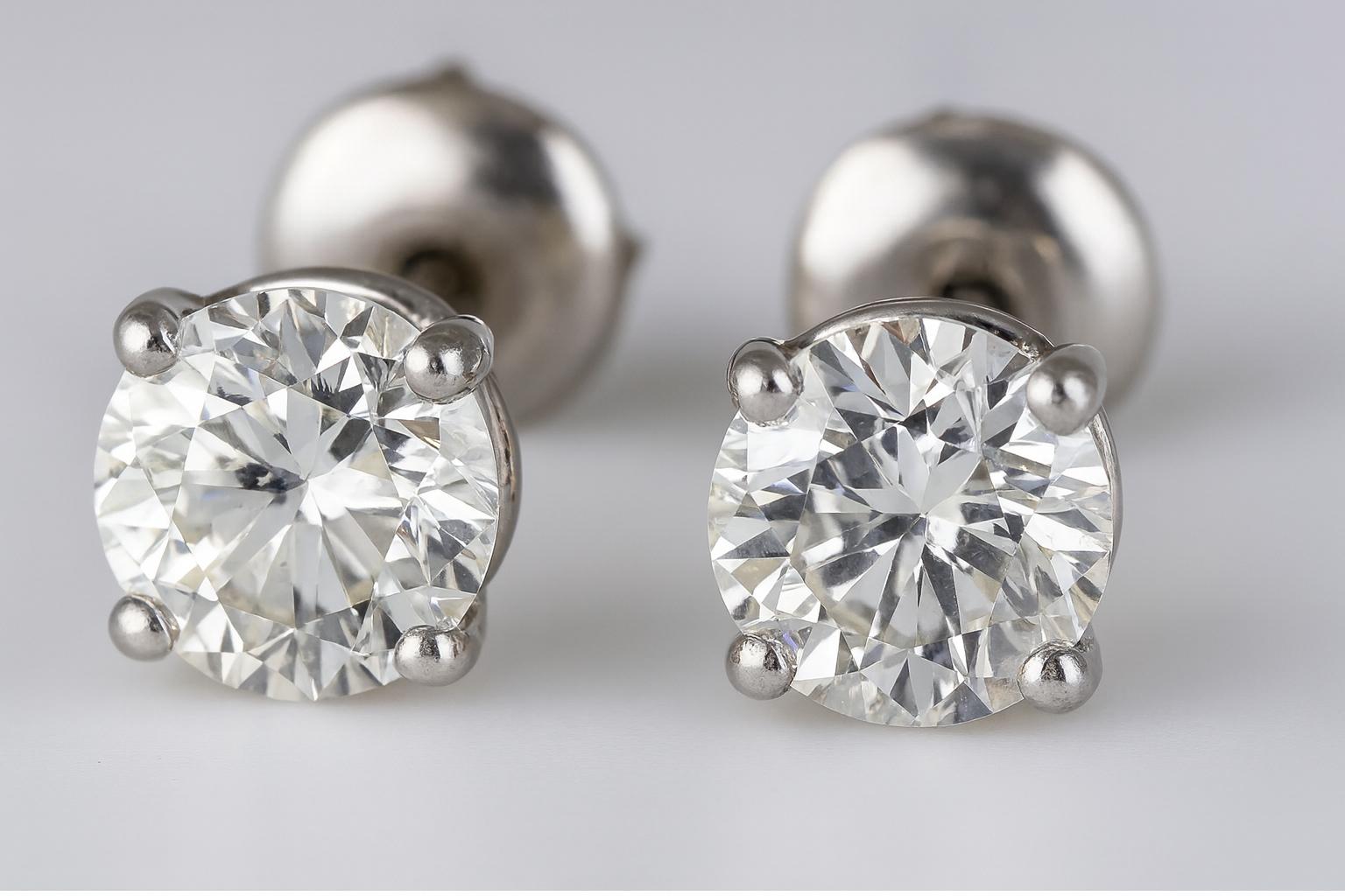 Contemporary 4.08 Carat Round Brilliant Diamond Stud Earrings -   Natural earth mined For Sale