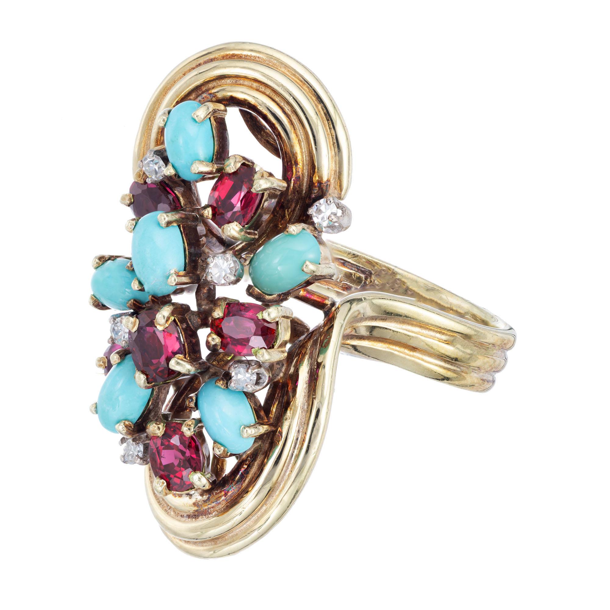 1960's Oval turquoise and rubies with round diamonds in a 14k yellow gold cocktail ring setting. 

6 round diamonds approx. total weight .18cts, G, VS
7 oval rubies approx total weight 2.10cts
6 oval turquoise approx total weight 1.80cts
Size 7 and