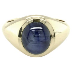 4.08 Carats Blue Star Sapphire set in 14K Yellow Gold Men's Ring