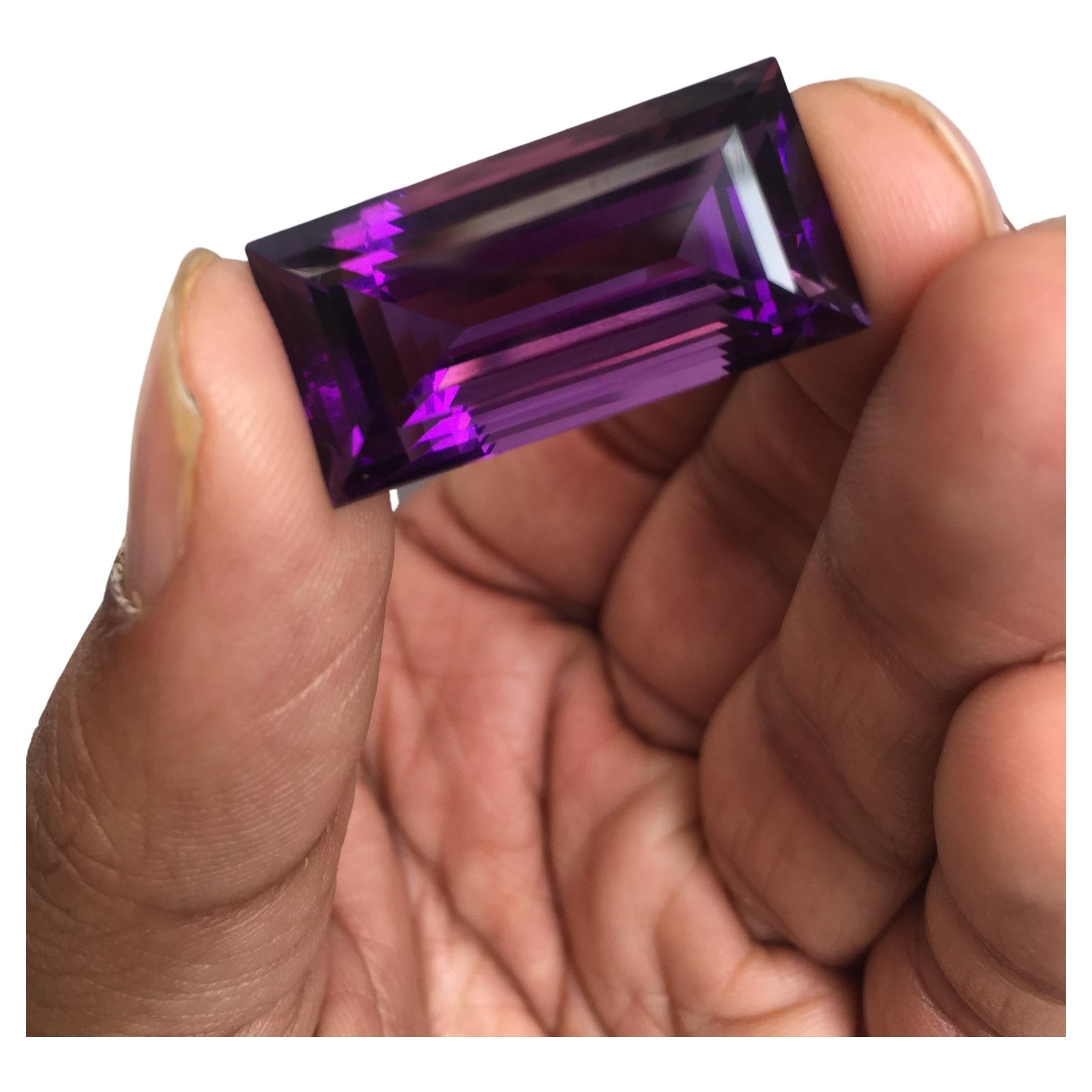 This stunning high-quality amethyst, which is a beautiful violet variety of quartz. The baguette shape of the gemstone adds a touch of sophistication and class, making it perfect for those looking for a statement piece. The natural beauty of the
