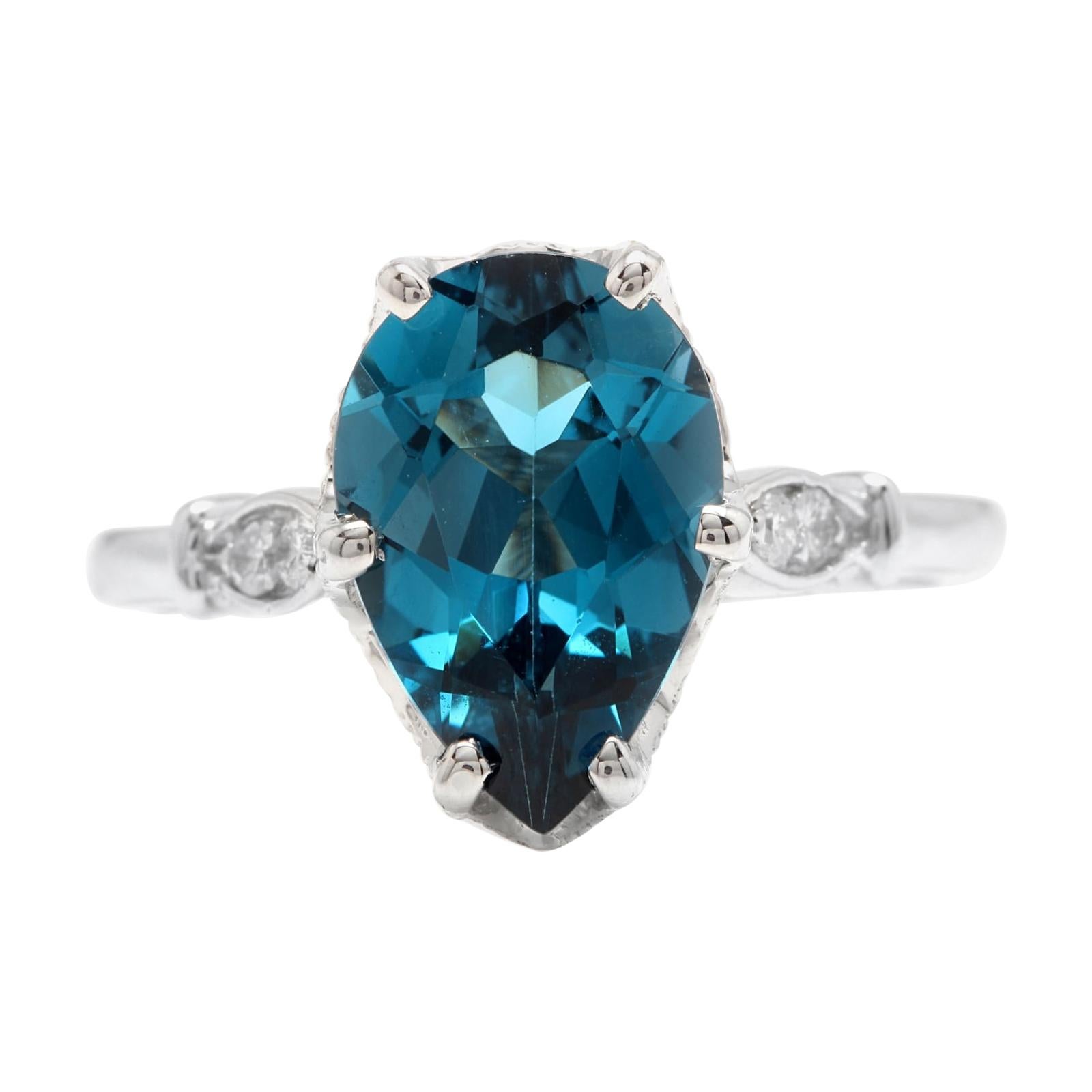 4.08 Carats Natural London Blue Topaz and Diamond 14k White Gold Ring For Sale