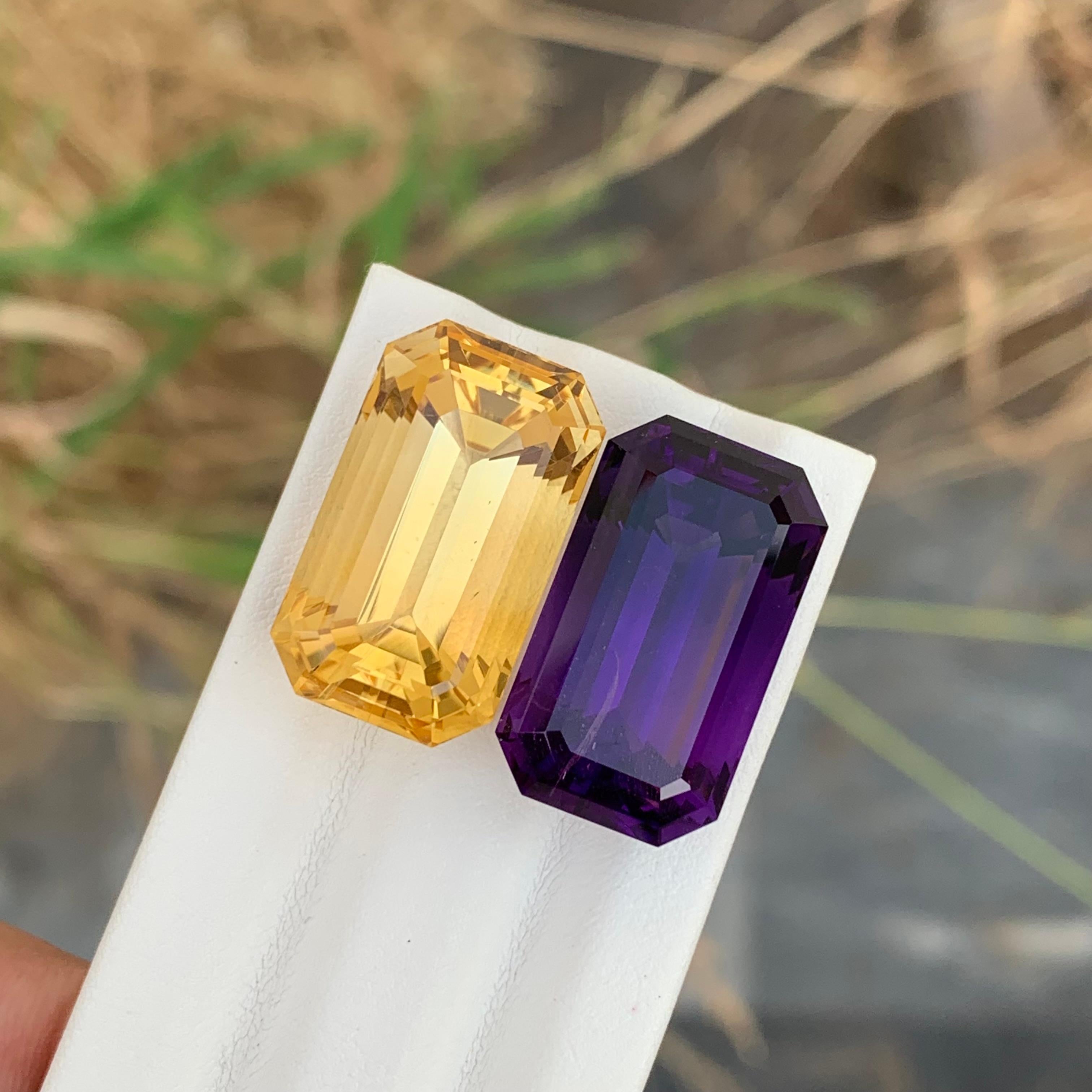 Arts and Crafts 40.80 Carat Natural Loose Citrine And Amethyst Reverse Pair Emerald Shape Gem For Sale