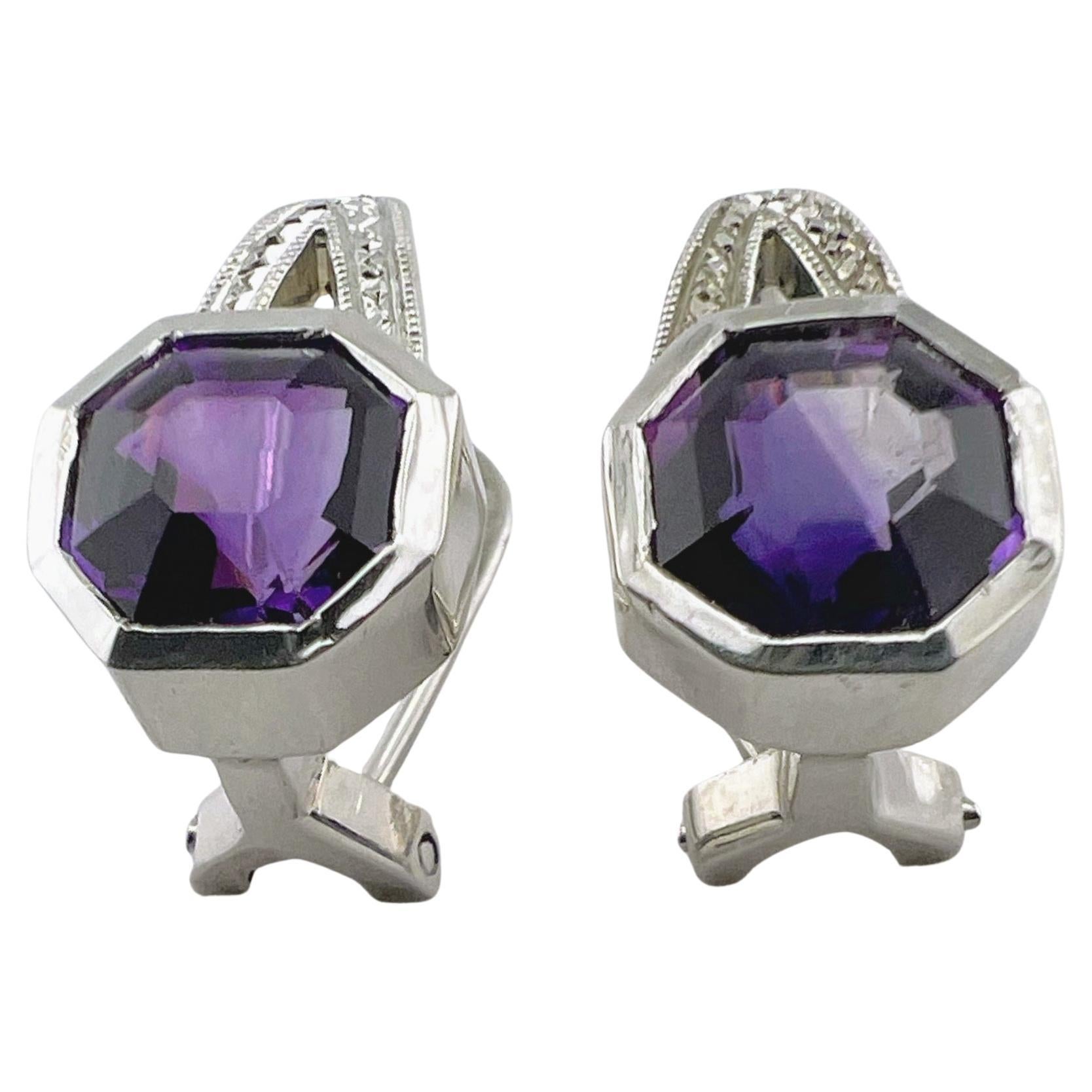 4.07ctw Amethyst Lever-Back Earrings in Sterling Silver

These earrings showcase 4.07 carats of precision-cut Asscher amethyst, highlighting their signature geometric brilliance. Each earring features a 2.04-carat natural Asscher-cut amethyst, with